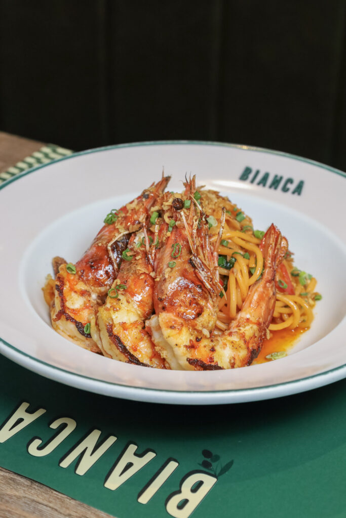 Spaghetti with prawns in tomato sauce served in a Bianca bowl