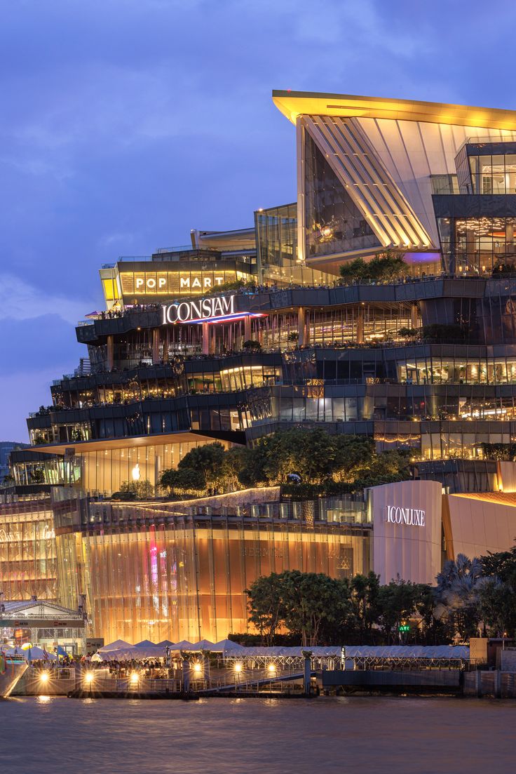 ICONSIAM lit up at dusk on the Chao Phraya River, home of a Bianca Italian restaurant in Bangkok